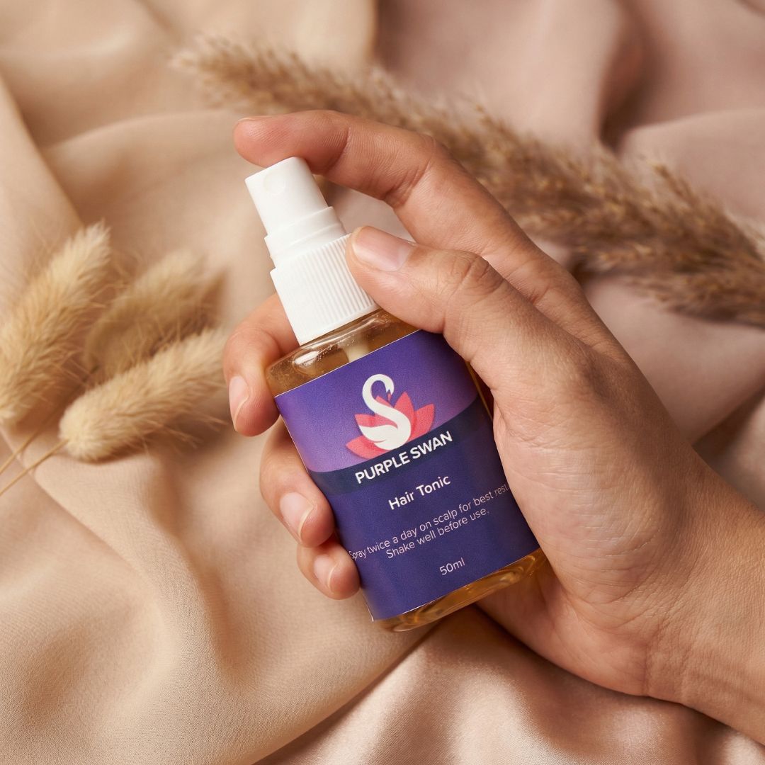 Purple Swan hair tonic spray bottle